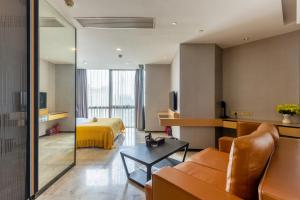 Area soggiorno di Yoyo Apartment Jiedeng Metropolis Branch, Beijing Road