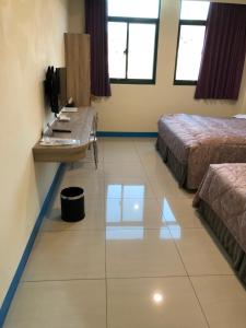 Letto o letti in una camera di Lohas Seaview B&B