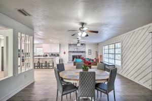 a kitchen and dining room with a table and chairs at Spacious Family Home w/ Backyard in Gainesville! in Gainesville