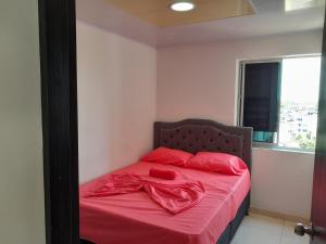 Giường trong phòng chung tại Apartamento suite mirador del llano
