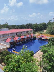 Bazén v ubytování Viceroy Beach And Spa Resort nebo v jeho okolí