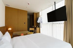TV a/nebo společenská místnost v ubytování Yangju Hotel Ippda