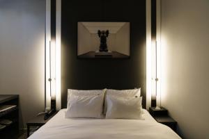 Postel nebo postele na pokoji v ubytování Yangju Hotel Ippda