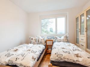 Letto o letti in una camera di Holiday Home Feldkirch Panoramic Views
