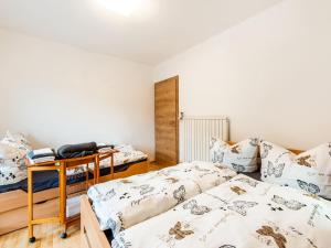 Letto o letti in una camera di Holiday Home Feldkirch Panoramic Views