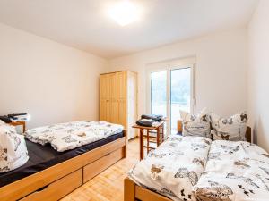 Letto o letti in una camera di Holiday Home Feldkirch Panoramic Views