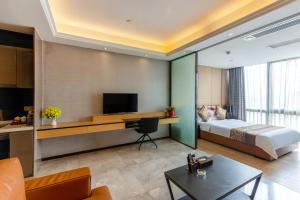 TV o dispositivi per l'intrattenimento presso Yoyo Apartment Jiedeng Metropolis Branch, Beijing Road