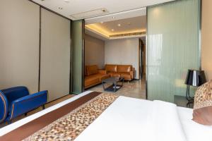 Area soggiorno di Yoyo Apartment Jiedeng Metropolis Branch, Beijing Road