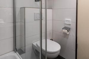 Koupelna v ubytování Globana Airport Hotel
