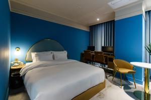 Postel nebo postele na pokoji v ubytování Yangju Hotel Ippda + 37 fotografií