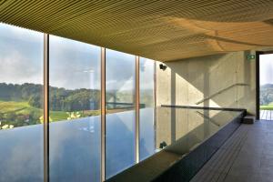 an external view of a building with a swimming pool at Hisa 1624 - Adults Only in Zgornja Kungota +50 photos