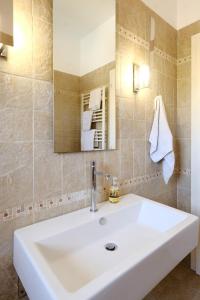 Koupelna v ubytování Casa Bianca + 23 fotografií