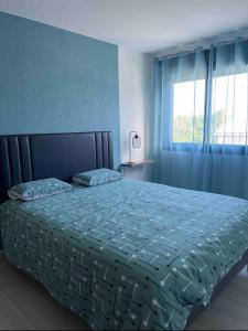 Postel nebo postele na pokoji v ubytování Villa Cap Marine