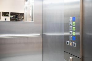 a close up of a metal elevator with a door at ING Hotel by WMM Hotels in Ingolstadt