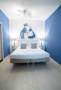Voodi või voodid majutusasutuse Hotel Johannes Vermeer Delft toas