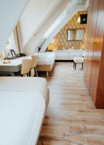Voodi või voodid majutusasutuse Hotel Johannes Vermeer Delft toas