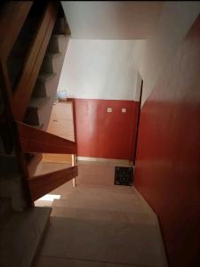 a view of a stairway in a room with red walls at Zdenka Studio Split in Split