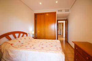 A bed or beds in a room at El Rinconcito