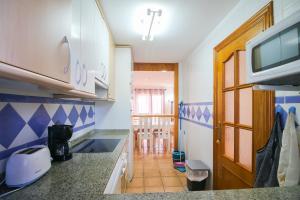 A kitchen or kitchenette at El Rinconcito