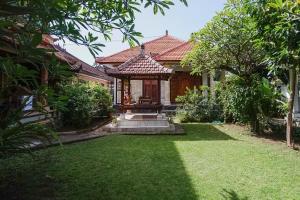 Zahrada ubytování Indopurejoy House - Komala Indah Cottages