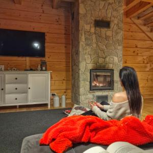 Et tv og/eller underholdning på LK Resort Łapsze domy z prywatną balią i sauną