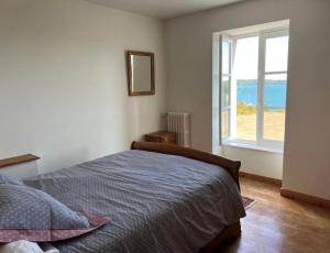 Posteľ alebo postele v izbe v ubytovaní La Maison de Garel