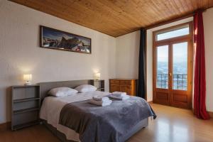 Ένα ή περισσότερα κρεβάτια σε δωμάτιο στο Résidence du Parc - Happy Rentals