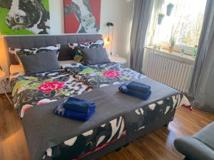 a bedroom with a bed with two pillows on it at Bremen Ferienwohnung in Bremen