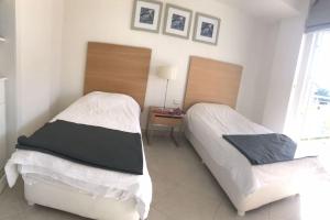 Posteľ alebo postele v izbe v ubytovaní Whyndam Residences Kusadası Golf&Spa