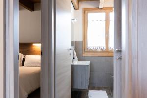 A bed or beds in a room at Residence Villa Brioschi