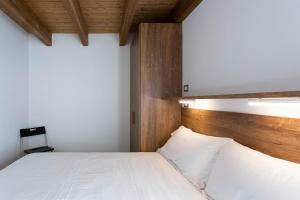 A bed or beds in a room at Residence Villa Brioschi
