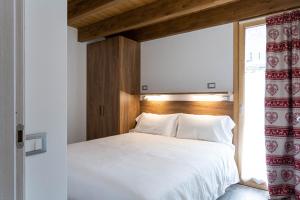 A bed or beds in a room at Residence Villa Brioschi