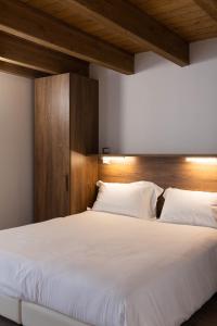 A bed or beds in a room at Residence Villa Brioschi