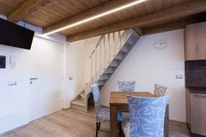 A television and/or entertainment centre at Residence Villa Brioschi