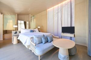 Hotel MYS Khao Yai客房内的一张或多张床位
