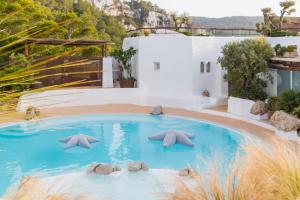 Piscina a Hacienda Na Xamena, Ibiza o a prop