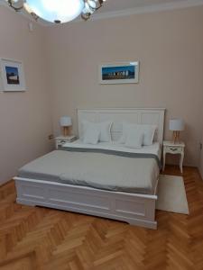 Posteľ alebo postele v izbe v ubytovaní Soltész Grand Residence