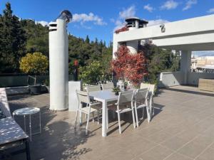 A patio or other outdoor area at Athens Lycabettus Hill Penthouse, Private Roof Garden & Pool
