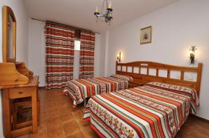 Posteľ alebo postele v izbe v ubytovaní APCOSTAS - Almuñecar Playa + 37 fotografií