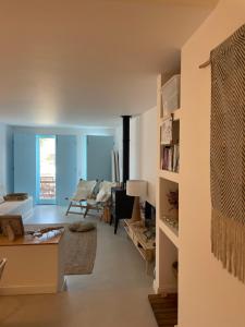 a living room with a couch and a table at New! Casa do Mar - Pedralva - Sagres- Surf & Nature in Vila do Bispo