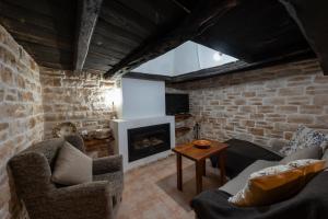 Et opholdsområde på VILLA ES CUBELLS COUNTRY & SEA