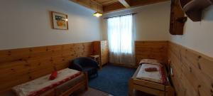 Postel nebo postele na pokoji v ubytování Apartmán Kienberg pod Lipenskou hrází