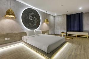 Ένα ή περισσότερα κρεβάτια σε δωμάτιο στο Jacayl Hotel TCG