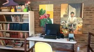 a desk with a laptop computer on top of it at 2 Casas lindas no paraiso! in Costa Dourada