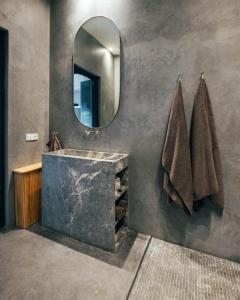 a bathroom with a sink and a mirror at Riad no37 in Marrakesh