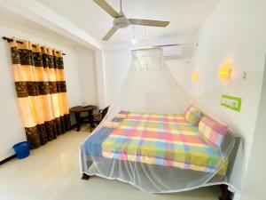 Letto o letti in una camera di Inu Vicky Beach Hotel
