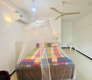 Letto o letti in una camera di Inu Vicky Beach Hotel