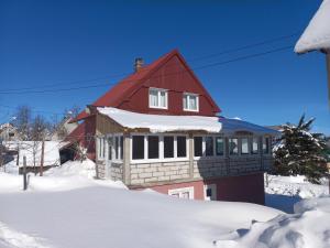 Apartmani Sobe Sljivancanin durante l'inverno