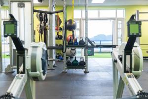 a gym with a row of weight machines at Holme Pierrepont Country Park Home of The National Water Sports Centre in Nottingham
