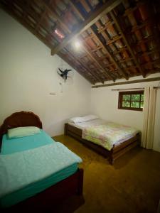 Casa Maia Sana Hostel客房内的一张或多张床位